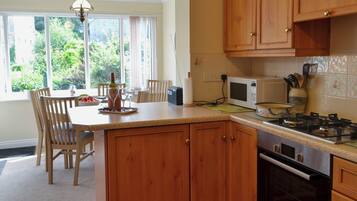 Dishwasher, high chair, cookware/dishes/utensils