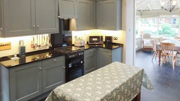 Dishwasher, high chair, cookware/dishes/utensils