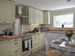 Dishwasher, highchair, cookware/dishes/utensils