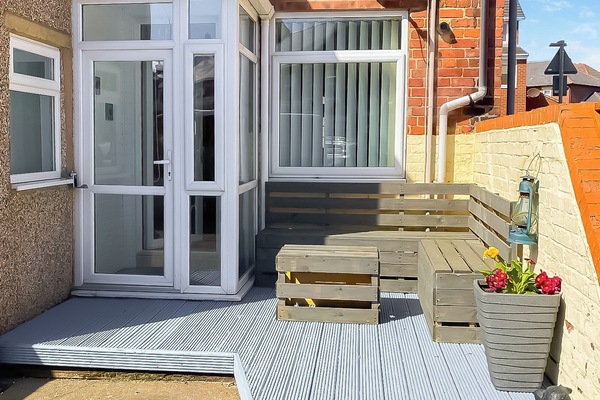 Holiday home with decked seating area | Seashells, Newbiggin-by-the-Sea, near Morpeth