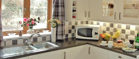 Dishwasher, high chair, cookware/dishes/utensils