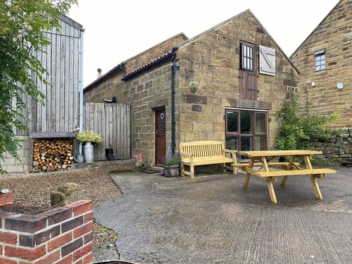 Panoramic countryside views can be savoured from this barn conversion.