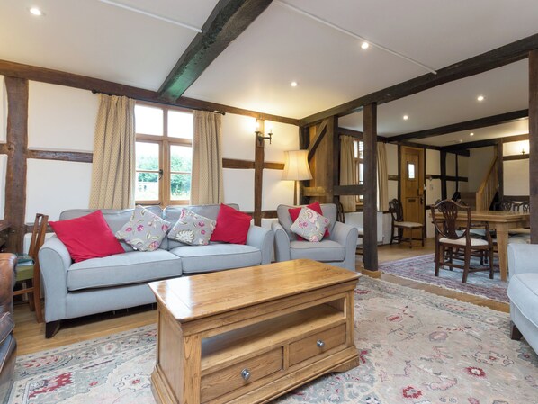 Open-aspect lounge packed with heritage features | Brook House - Netherley Hall Cottages, Mathon, near Malvern - 5 bedroom accommodation in Mathon, near Malvern (Mathon, near Malvern)