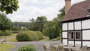 Outdoor dining - Parker’s dates from 1610 and is part of the 700-acre Netherley Hall Estate. (Mathon, near Malvern)
