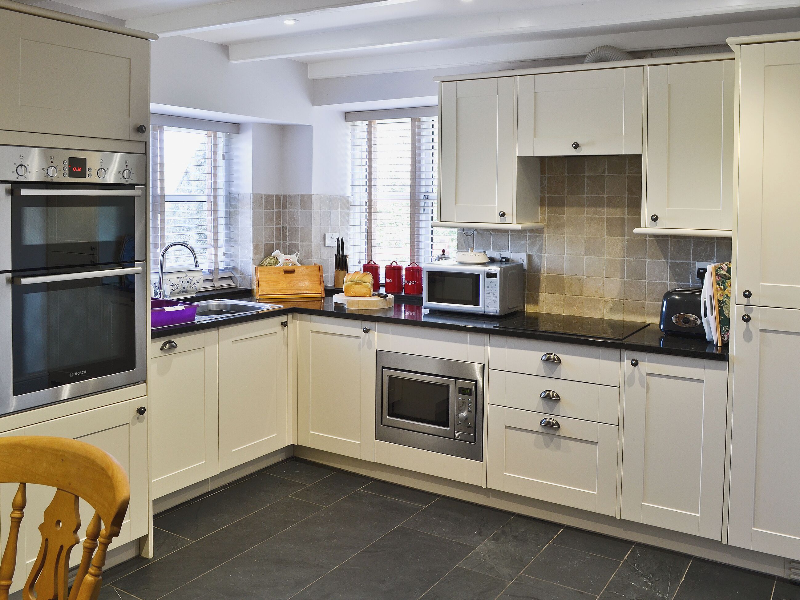 Dishwasher, highchair, cookware/dishes/utensils