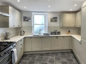 Dishwasher, high chair, cookware/dishes/utensils