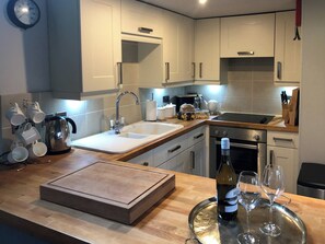 Dishwasher, high chair, cookware/dishes/utensils