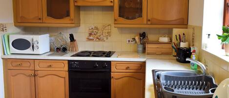 Dishwasher, highchair, cookware/dishes/utensils