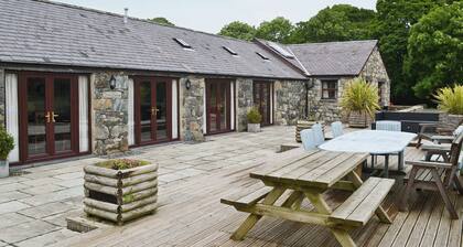 Spacious barn conversion with a riverside location.