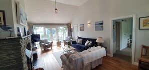 Smart TV, fireplace, DVD player, books