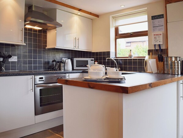 Dishwasher, high chair, cookware/dishes/utensils