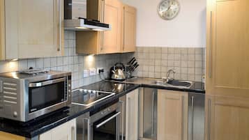 Dishwasher, high chair, cookware/dishes/utensils