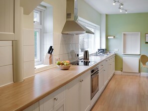 Well-equipped galley style kitchen | Cobble Rigg, Threlkeld, near Keswick - 3 bedroom accommodation in Threlkeld, near Keswick (Threlkeld, near Keswick)