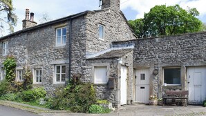 A stone building with two visible doors, one labeled "Goss's Grill." - 2 bedroom accommodation in Starbotton, near Skipton (Starbotton, near Skipton)