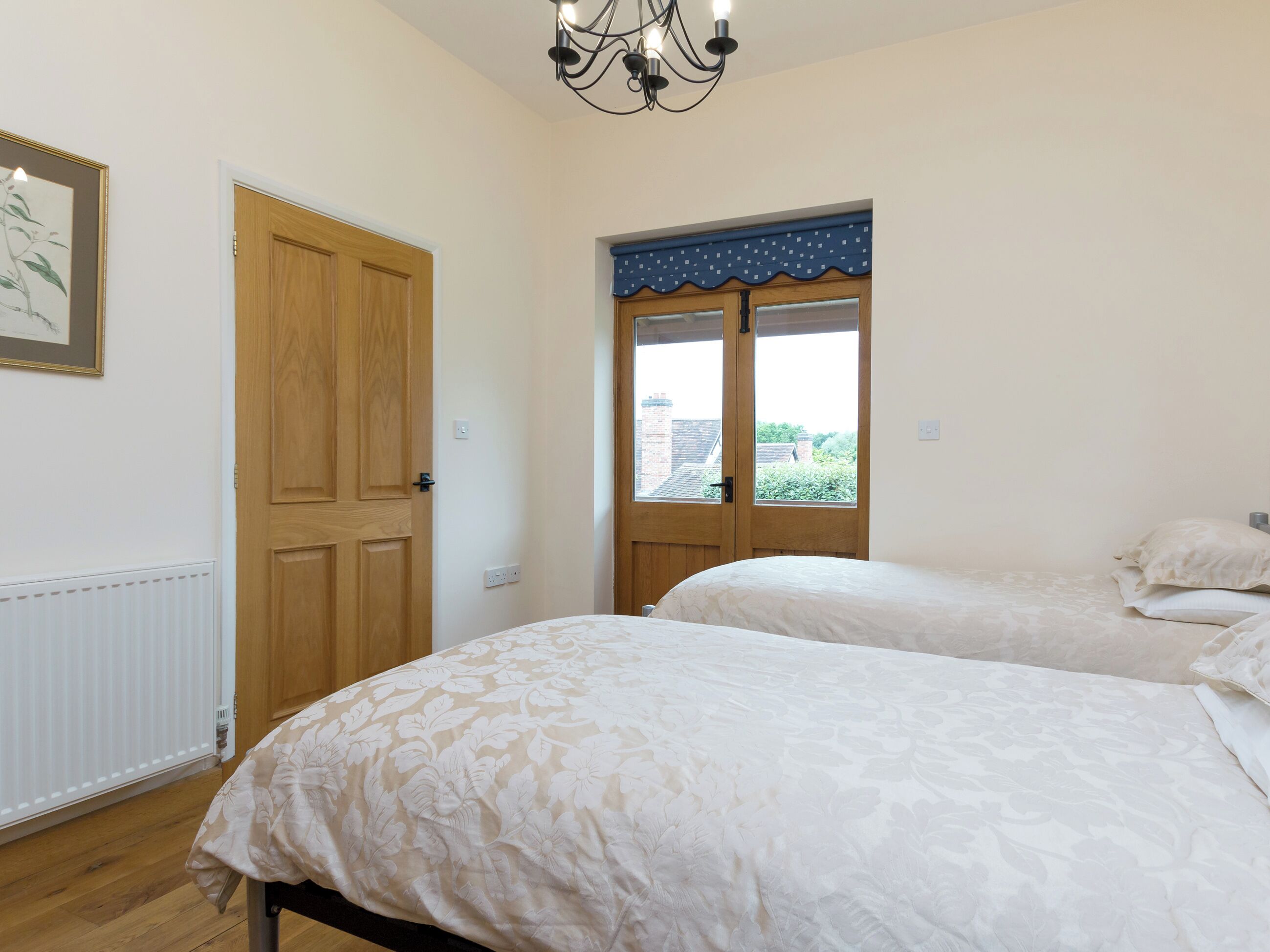 Twin bedroom | Parkers Lodge - Netherley Hall Cottages, Mathon, near Malvern