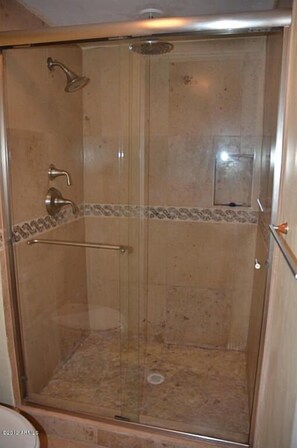Combined shower/tub, hair dryer, towels, toilet paper