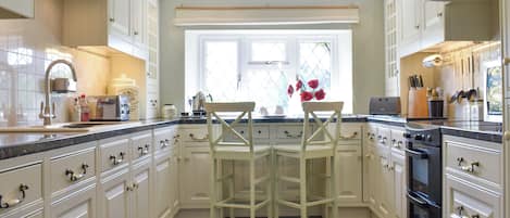 Dishwasher, high chair, cookware/dishes/utensils