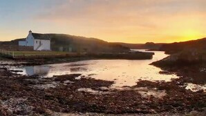 A white building with a staircase, a river, and hills in the background. - 4 bedroom accommodation in Rispond, near Durness (Rispond, near Durness)