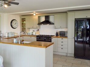 Dishwasher, high chair, cookware/dishes/utensils, freezer - 3 bedroom accommodation in Penelewey, near Truro (Penelewey, near Truro)