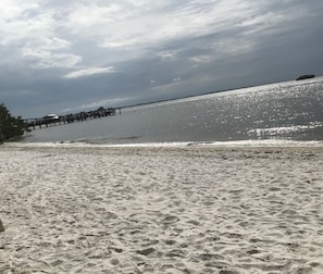 On the beach, sun loungers, beach towels