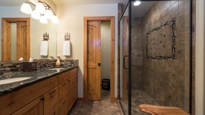 Combined shower/tub, hair dryer, towels, soap