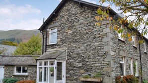A stone house with a sign reading 'The Coach House.' - Coach House Grasmere (Grasmere)