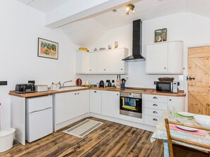 Dishwasher, highchair, cookware/dishes/utensils - 1 bedroom accommodation in Llandwrog, near Caernarfon (Llandwrog, near Caernarfon)