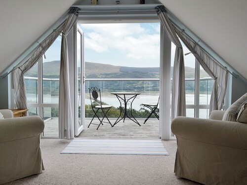 Set on the headland with fantastic mountain and sea views.