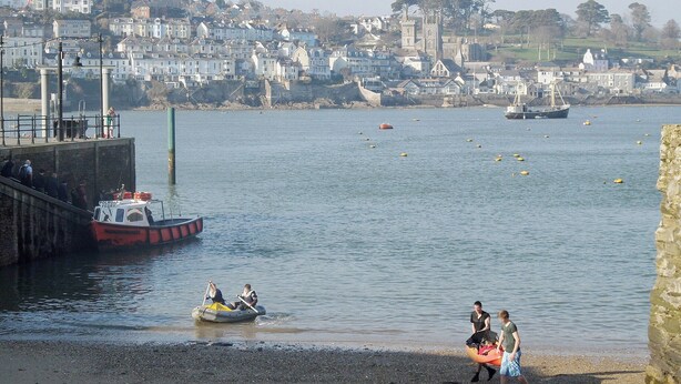 A coastal town with a ferry dock, boats, and a beach. - 3 bedroom accommodation in Polruan-by-Fowey (Polruan-by-Fowey)