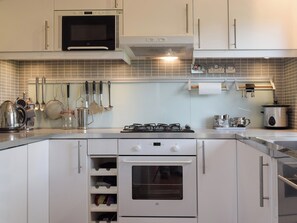 Dishwasher, high chair, cookware/dishes/utensils