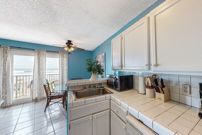 Waterfront beach-view condo with pool & direct beach access