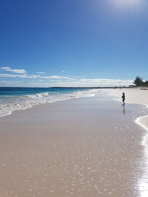 On the beach, sun-loungers, beach towels