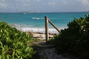 On the beach, sun-loungers, beach towels