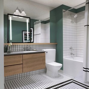 Un baño moderno con tocador de madera, inodoro blanco, bañera y ducha con cortina.
