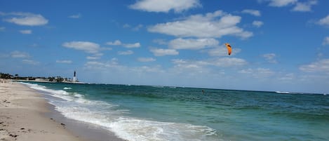 On the beach, sun loungers, beach umbrellas, beach towels