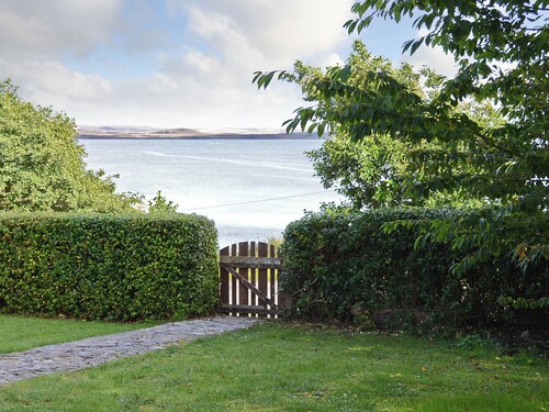 A generously sized property with stunning views across Loch Ewe.