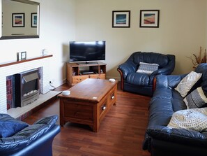 TV - A generously sized property with stunning views across Loch Ewe. (Inverasdale near Poolewe)