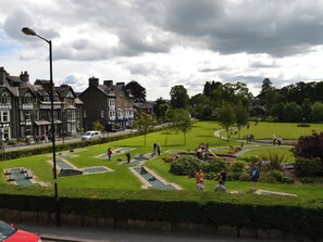 Property grounds - A luxury apartment overlooking the bowling green in the village of Ambleside. (Ambleside)