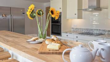Dishwasher, high chair, cookware/dishes/utensils