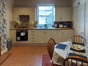 Dishwasher, high chair, cookware/dishes/utensils