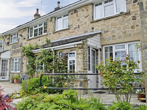 20 steps to entrance with handrail.
