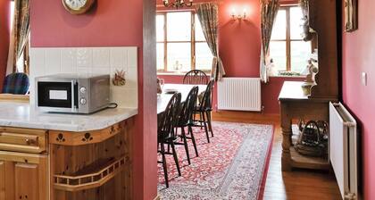 Ground Floor:
Living room: TV, Open Fire
Dining room.