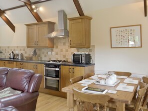 Dishwasher, high chair, cookware/dishes/utensils, freezer - 3 bedroom accommodation in Poundstock, Bude (Poundstock, Bude)