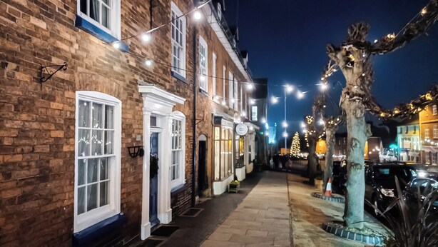 A narrow street lined with brick buildings, some with white-framed windows and doors. - 4 bedroom accommodation in Cleobury Mortimer, near Ludlow (Cleobury Mortimer, near Ludlow)