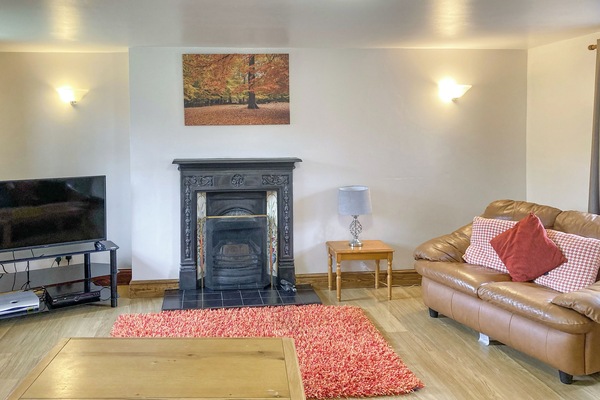 Living area | The Milking Parlour - Harbut Law Holiday Cottages, Alston