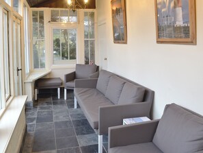 TV, fireplace - Swiss Cottage is Grade II listed and simply oozes character. (Chideock, near Bridport)