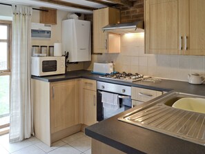 Astianpesukone, syöttötuoli