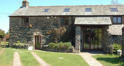 A luxury barn conversion, with superb quality kitchen and extra shower room.