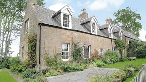 A stone building with multiple windows and a garden pathway. - 4 bedroom accommodation in Bayfield, Nigg (Bayfield, Nigg)