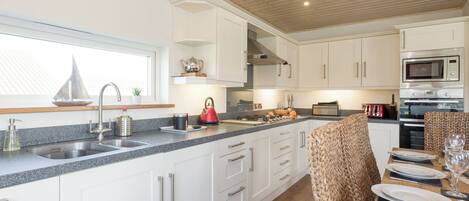Dishwasher, highchair, cookware/dishes/utensils
